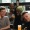 friends drinking beer together at a bar