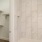 a bathroom with a shower and closet
