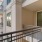 a patio with a black railing