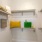 a closet with shelves with pillows and bags on them