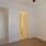 a room with doorways and carpet