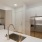 a kitchen with white cabinets