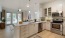 a kitchen with white cabinets